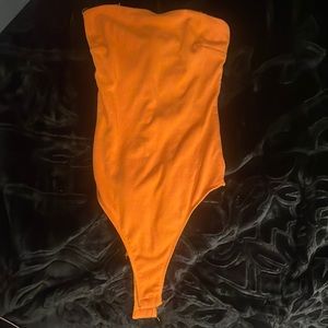 Orange body suit